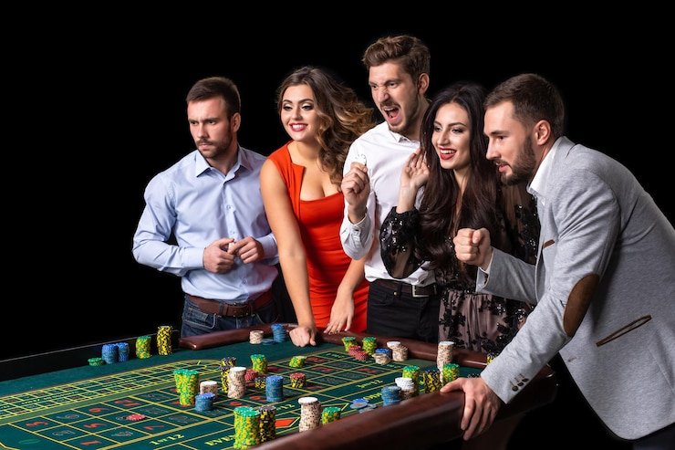 Live casino blackjack and roulette tables with dealers